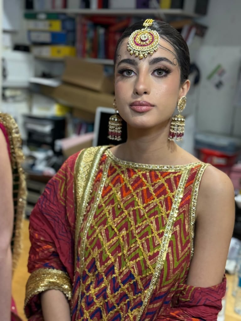 Bridal jewelry red purple outfit backstage