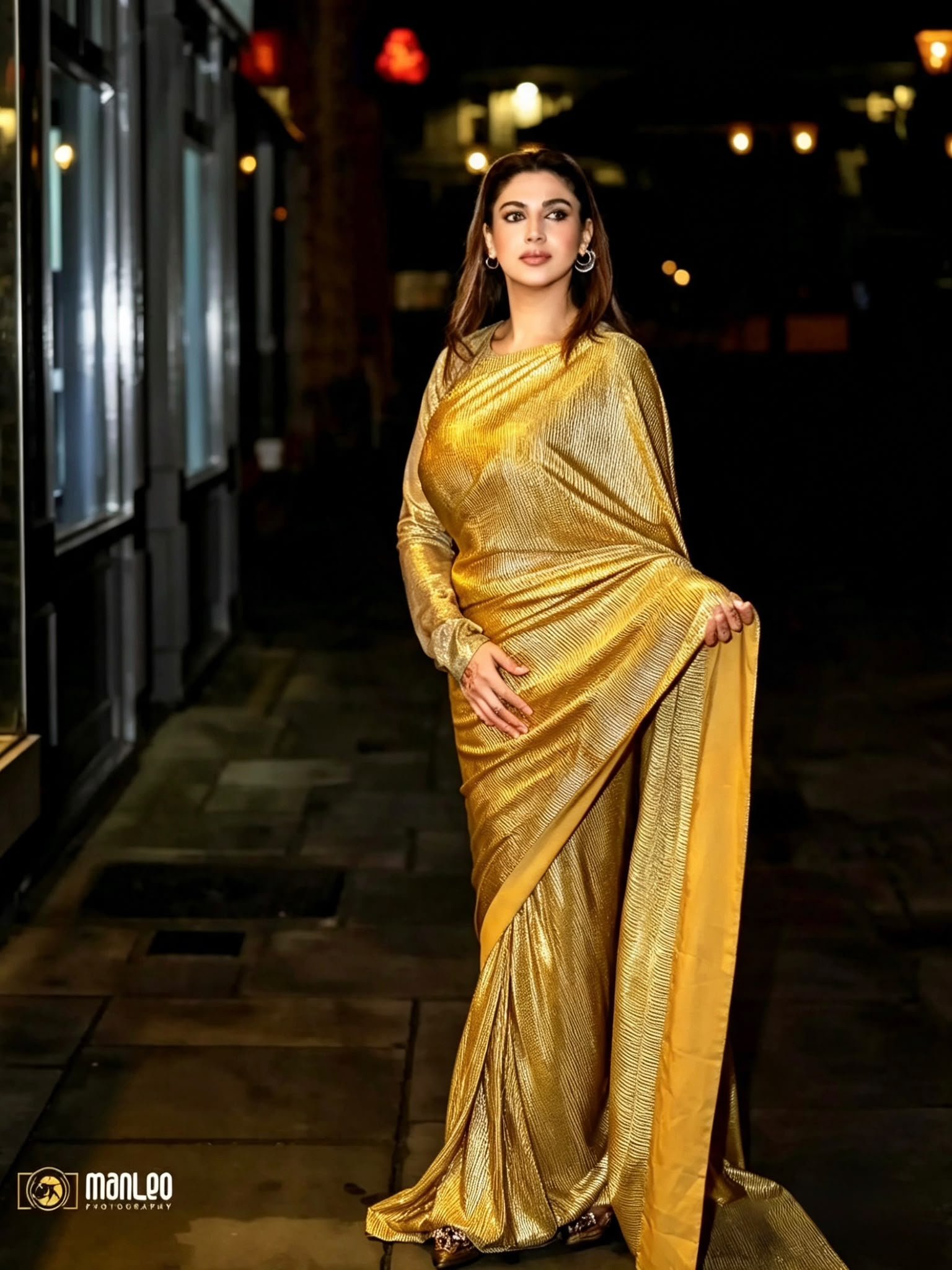 Gold metallic saree night street