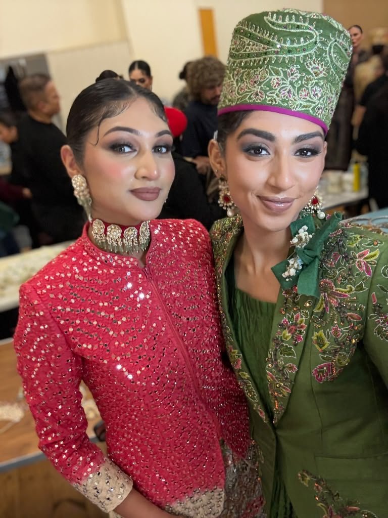 Performers red green traditional outfits